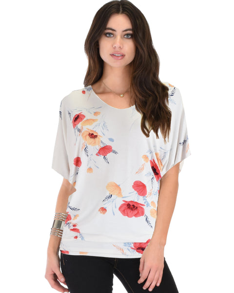 Lyss Loo White Floral Contemporary Dolman Tunic Top. Available in plus sizes.