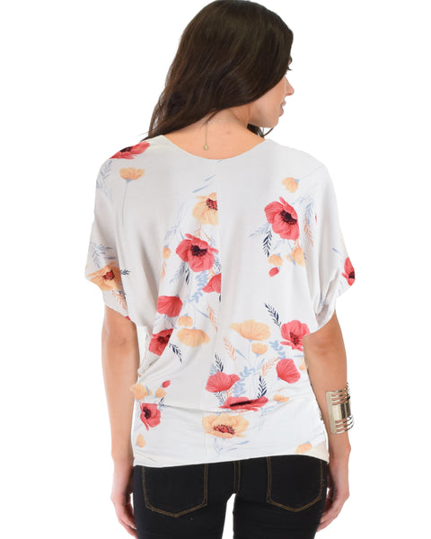 Lyss Loo White Floral Contemporary Dolman Tunic Top. Available in plus sizes.